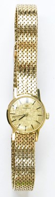 Lot 1163 - OMEGA; a 9ct yellow gold cocktail watch, the...