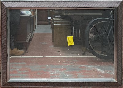 Lot 7 - A rectangular wall mirror, with bevelled plate...