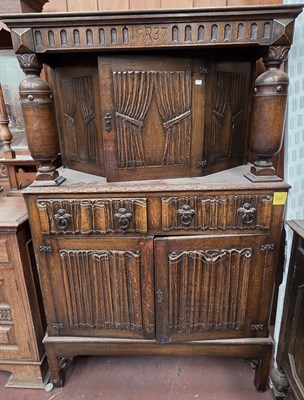 Lot 20 - An early 20th century oak court cupboard,...