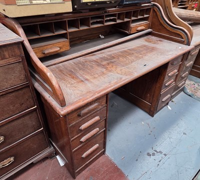 Lot 28 - An early 20th century oak roll-top clerk's...
