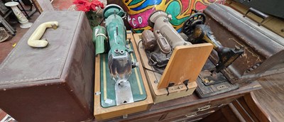 Lot 30 - Three sewing machines comprising Minerva,...