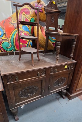 Lot 35 - An early 20th century oak sideboard, with...