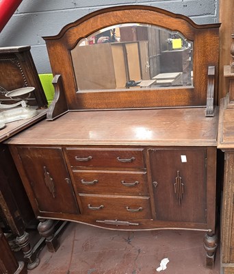 Lot 40 - A 1940s oak mirror back dresser, with shaped...