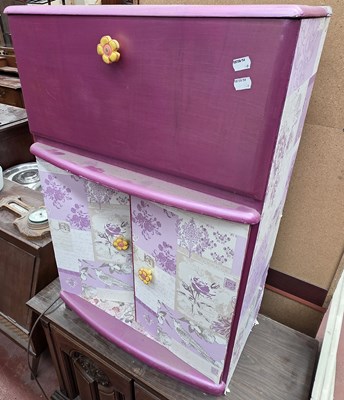 Lot 54 - A 1940s drinks cabinet painted in pink and...