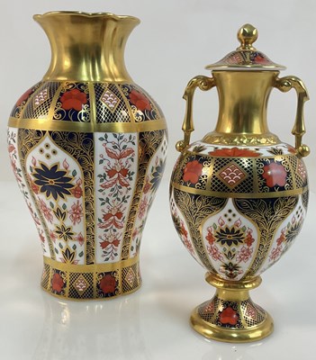 Lot 242 - ROYAL CROWN DERBY; a twin handled vase and...