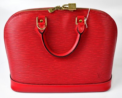 Lot 563 - LOUIS VUITTON; a c. 2002 Alma PM bag in red...