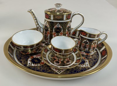 Lot 243 - ROYAL CROWN DERBY; a miniature tea set in the '...
