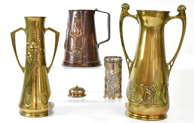 Lot 664 - WMF; a large Art Nouveau brass twin handled...