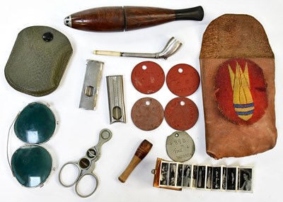 Lot 626 - Four WWI vulcanised asbestos dog tags, three...