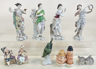 Lot 342 - Four Continental figures of ladies, together...