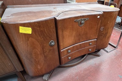Lot 75 - BEAUTILITY; a vintage walnut veneered drinks...