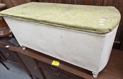 Lot 76 - LLOYD LOOM; a white painted ottoman, with...