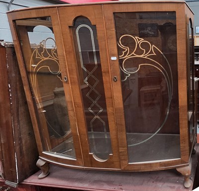 Lot 85 - A retro walnut veneered bow-front display...