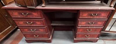 Lot 86 - A reproduction mahogany-effect six-drawer twin...