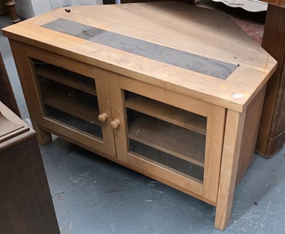 Lot 97 - A contemporary beech corner TV stand, with...