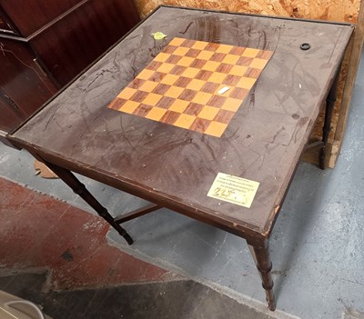 Lot 99 - A reproduction inlaid games table, raised on...