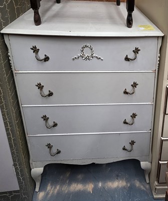 Lot 108 - A white painted gilt-heightened chest of four...