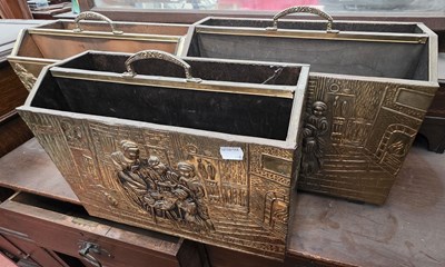 Lot 114 - Three vintage brass magazines racks with...