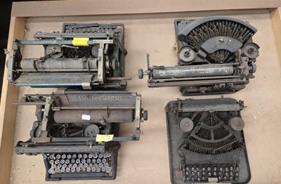Lot 116 - Four vintage typewriters in various states of...