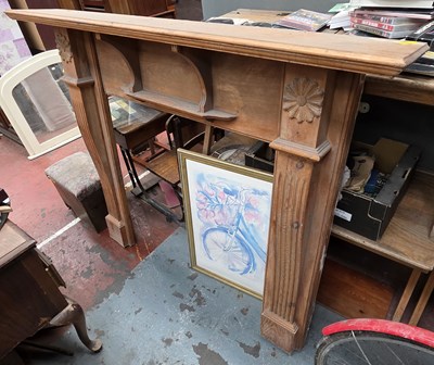 Lot 119 - A contemporary stripped pine fire surround...
