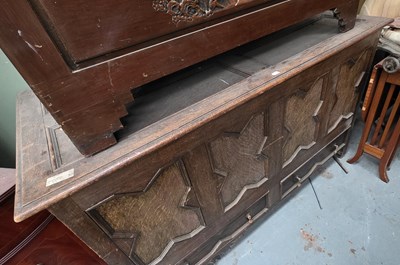 Lot 124 - A 19th century oak coffer, the two-panelled...