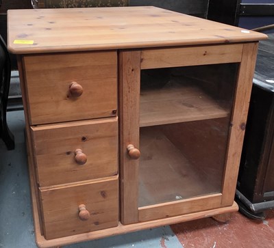 Lot 131 - A contemporary pine hi-fi cabinet, with single...