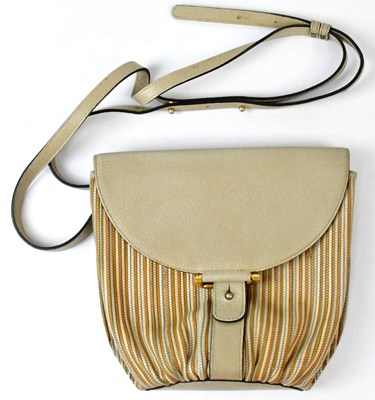 Lot 562 - DELVAUX; a multi colour pebble leather Toile...