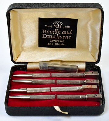 Lot 702 - BOODLE & DUNTHORNE; a set of four sterling...