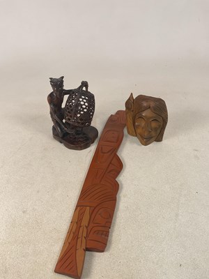 Lot 9 - KAKEK WAYAN, BALI; a carved figure of a...
