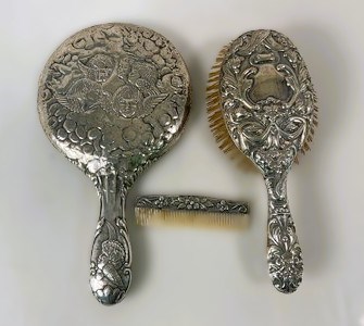 Lot 577 - A Edward VII hallmarked silver three piece...