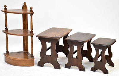 Lot 179 - ERCOL; a nest of tables with rounded...