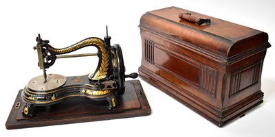 Lot 533 - A Jones gilt heightened black lacquered hand...