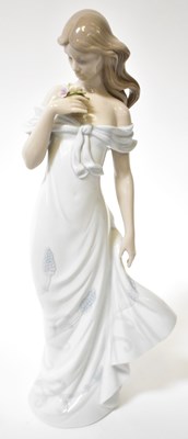 Lot 222 - LLADRÓ; a figure of a lady wearing a flowing...