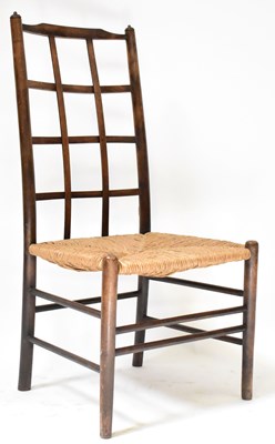 Lot 155 - A Liberty & Co Sussex chair attributed to...