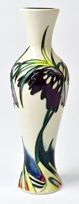 Lot 253 - MOORCROFT; a seconds quality cream ground...