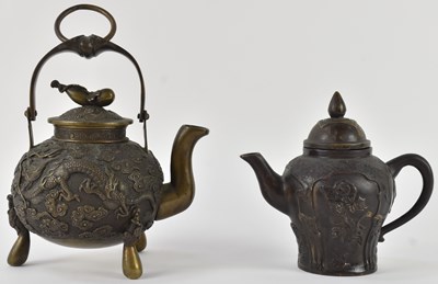 Lot 1015 - An early 20th century Chinese bronze teapot,...