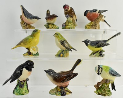 Lot 227 - BESWICK; five collectors' pottery bird...