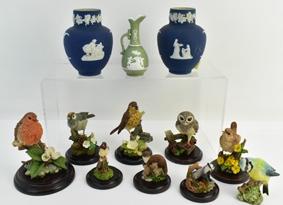 Lot 502 - COUNTRY ARTISTS; eight wildlife ornaments on...
