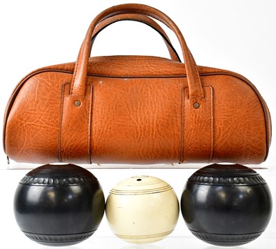 Lot 648 - GREEN MASTER; a pair of lignum vitae bowling...