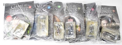 Lot 423 - GAME OF THRONES; an incomplete run of Official...