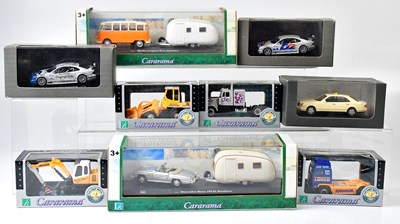 Lot 377 - A collection of seven Cararama boxed diecast...