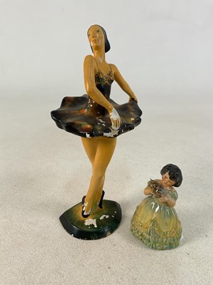 Lot 323 - WADE; a figure of a young girl holding a...