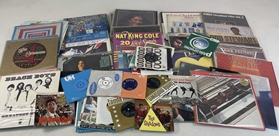 Lot 42 - A collection of 45s and LPs to include the...