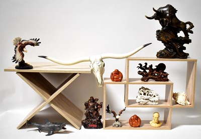 Lot 512 - A collectors' lot of wooden, resin and plastic...