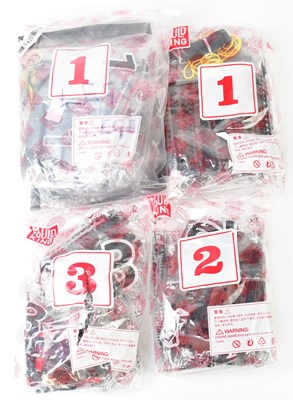 Lot 417 - A quantity of Lego-style kits, bagged in their...