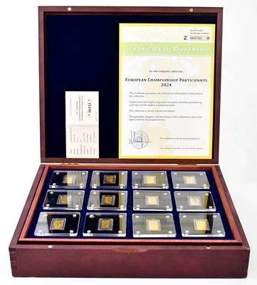Lot 1085 - A boxed set of 24ct gold ingots relating to...