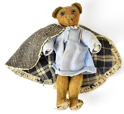 Lot 483 - An Edwardian teddy bear, straw filled, with...