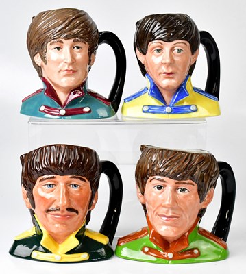Lot 269 - ROYAL DOULTON; a set of four The Beatles...