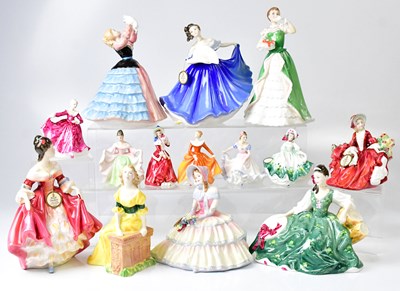 Lot 231 - ROYAL DOULTON; fourteen figures of ladies in...