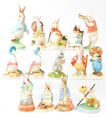 Lot 246 - Eighteen Beatrix Potter figures comprising...
